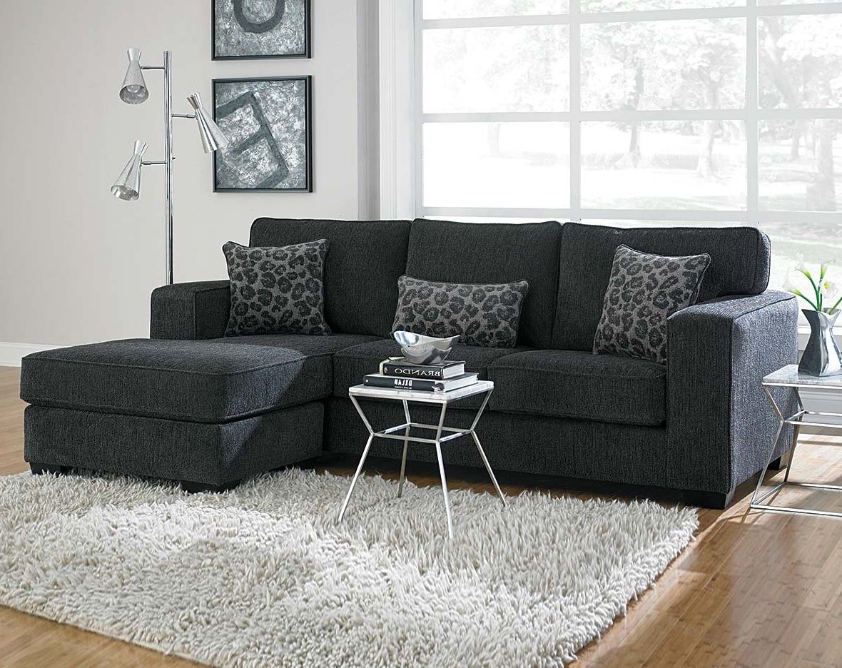 Well Known This Dark Gray Sectional Sofa Is Covered In A Soft Chenille And Throughout Charcoal Grey Sofas (Photo 1 of 15)