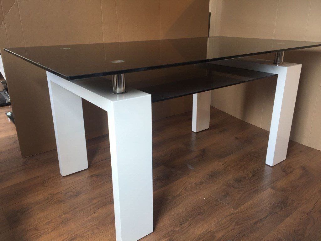 Metro Dining Tables Intended For Well Liked Metro Dining Table With Black Glass Top And White Legs (View 10 of 25)