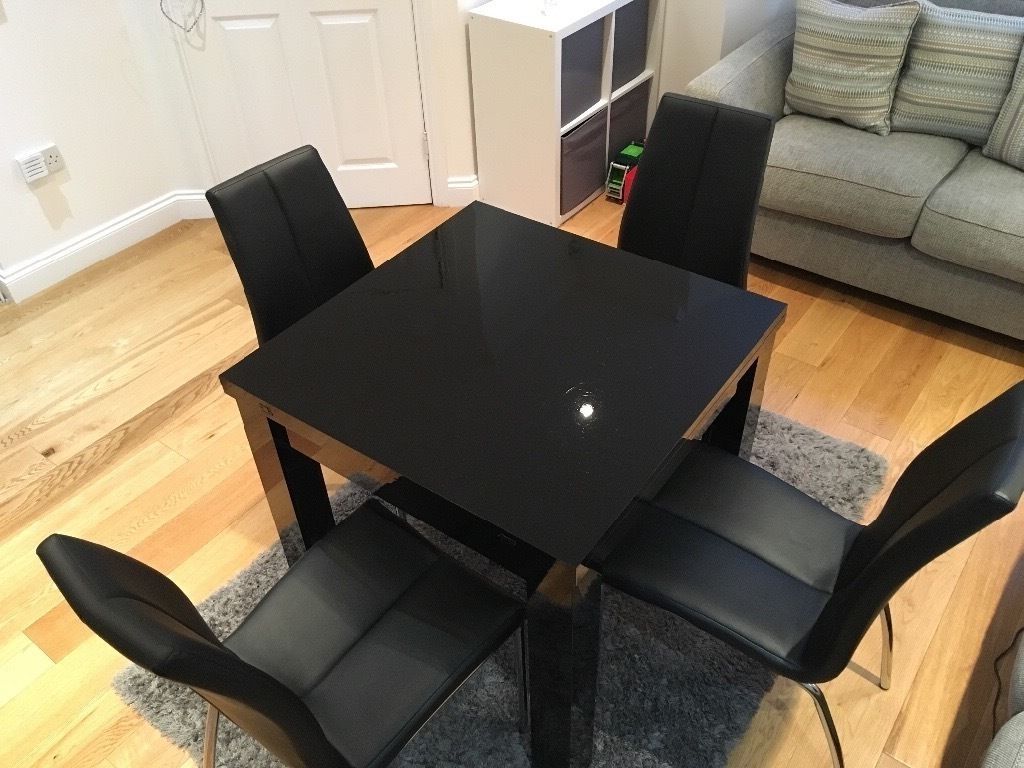 Newest Next Black Gloss Extending Dining Table And Matching Chairs (Photo 13 of 25)
