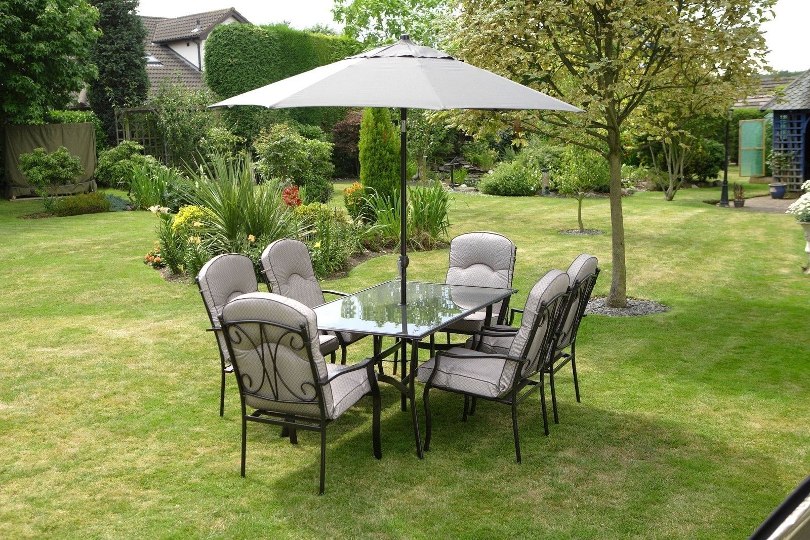 Preferred Quality Black Grey Padded 6 Seater 8 Piece Metal Garden Dining Set Intended For Garden Dining Tables And Chairs (View 7 of 25)