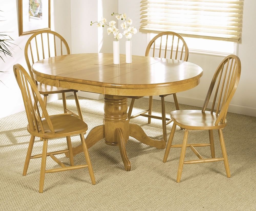Worcester Round Extending Dining Table And 4 Chairs Ashley Dining Inside Recent Round Extendable Dining Tables And Chairs (Photo 6 of 25)
