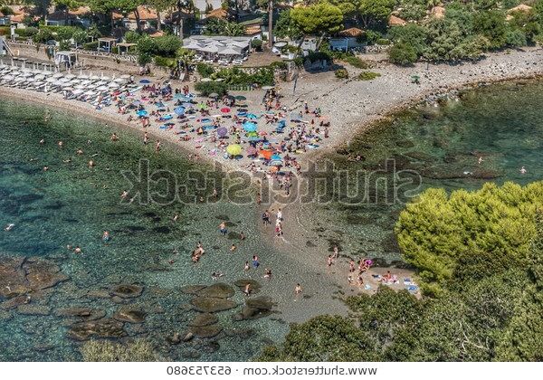 Well Known Colorful People Umbrellas On Beach Drone Stock Photo (Edit Now With Bella Beach Umbrellas (View 14 of 25)