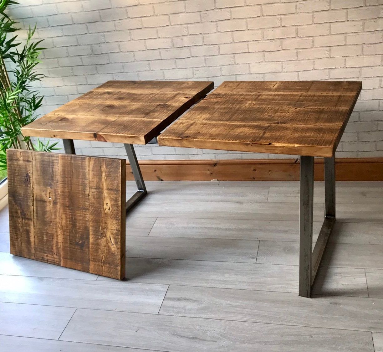 Extending Industrial Dining Table With Trapezium Legs Inside Most Popular Faye Extending Dining Tables (View 12 of 25)