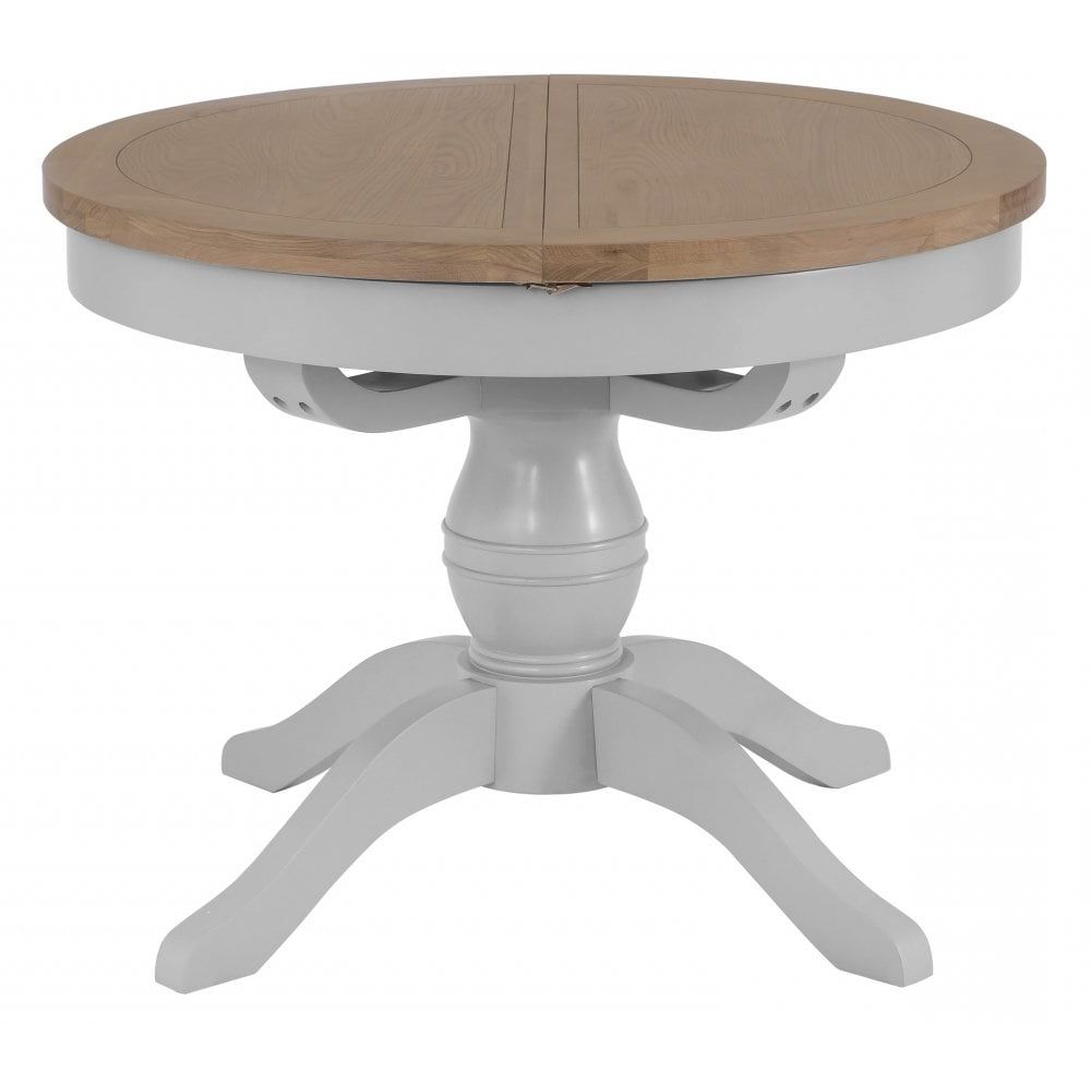 Latest Gray Wash Banks Pedestal Extending Dining Tables Throughout Tennyson Grey Round Butterfly Extending Table (View 16 of 25)