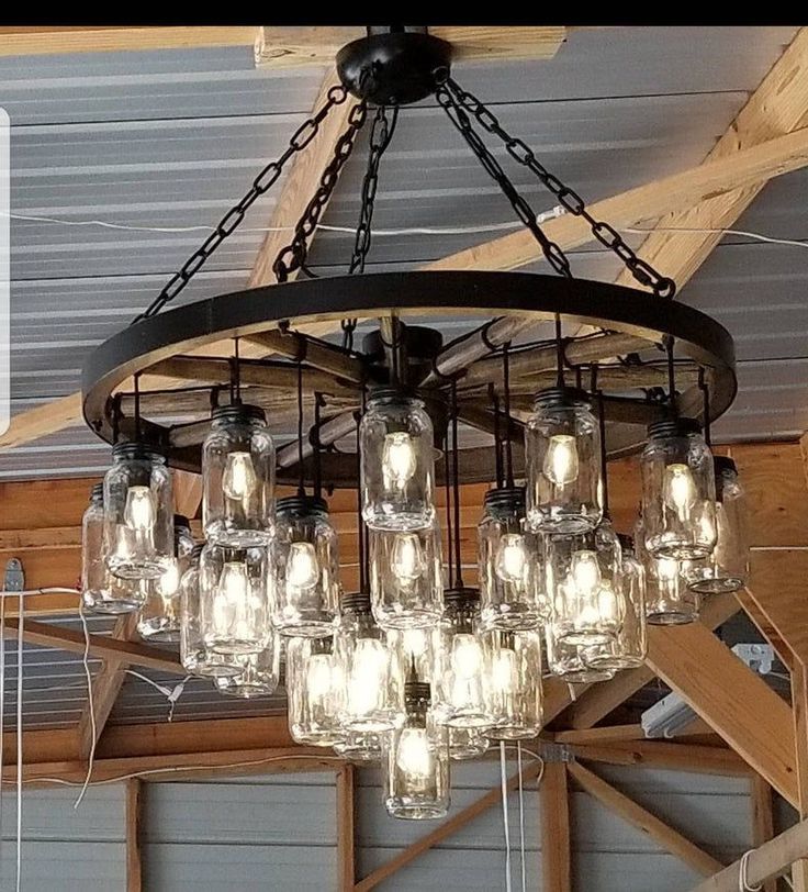 Wagon Wheel Chandeliers Throughout Preferred A Wagon Wheel Chandelier With A Mix Of Rustic/Vintage (View 5 of 15)
