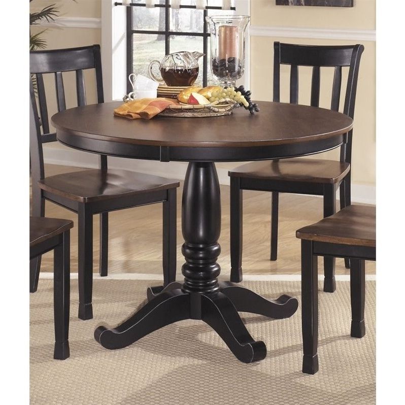 Latest Ashley Owingsville Round Dining Table In Black And Brown Pertaining To Brown Dining Tables (View 10 of 15)