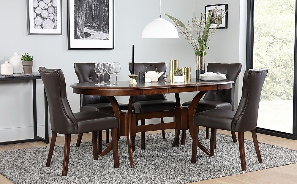 Townhouse Oval Dark Wood Extending Dining Table With 4 For Recent Brown Dining Tables (View 13 of 15)