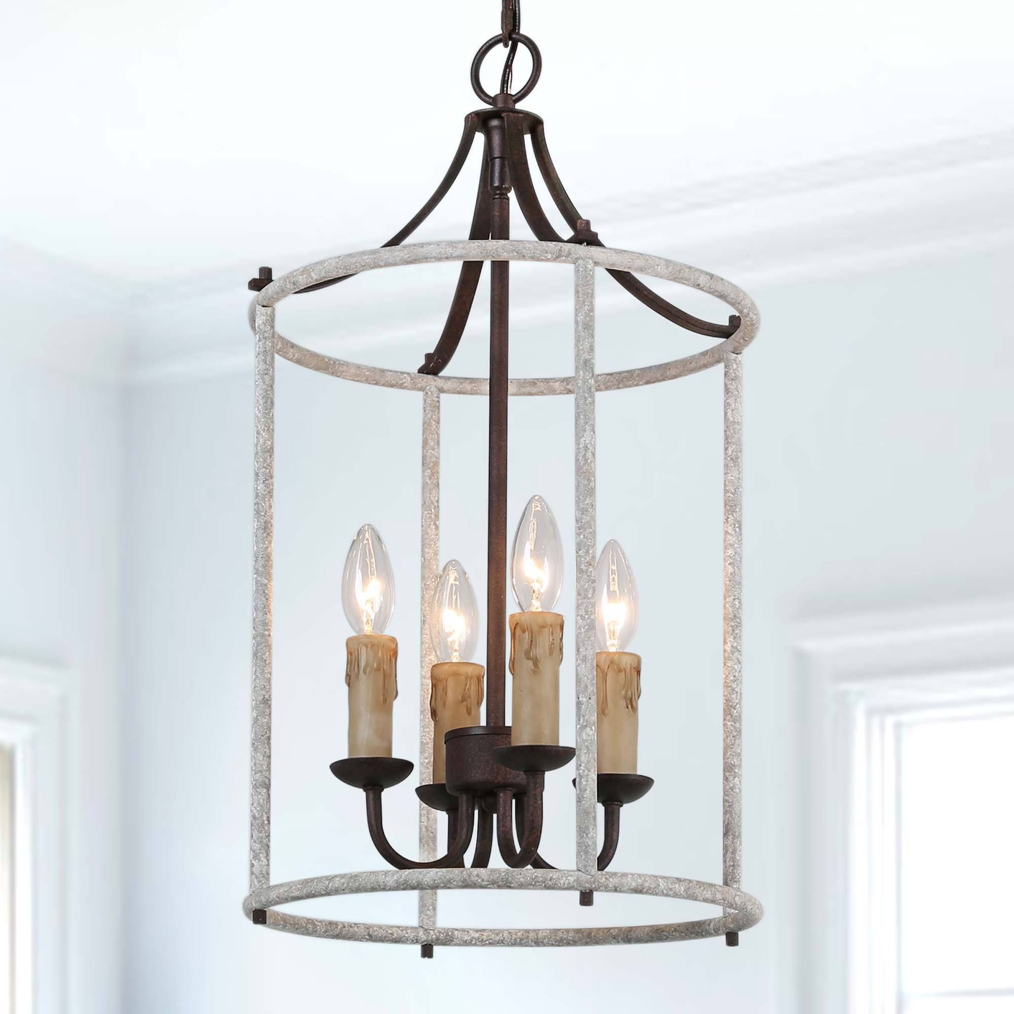 Deco Polished Nickel Lantern Chandeliers Regarding Well Known New World Decor Ribbon 4 Light Distressed Gray And Bronze Coastal Cage  Chandelier In The Chandeliers Department At Lowes (View 12 of 15)