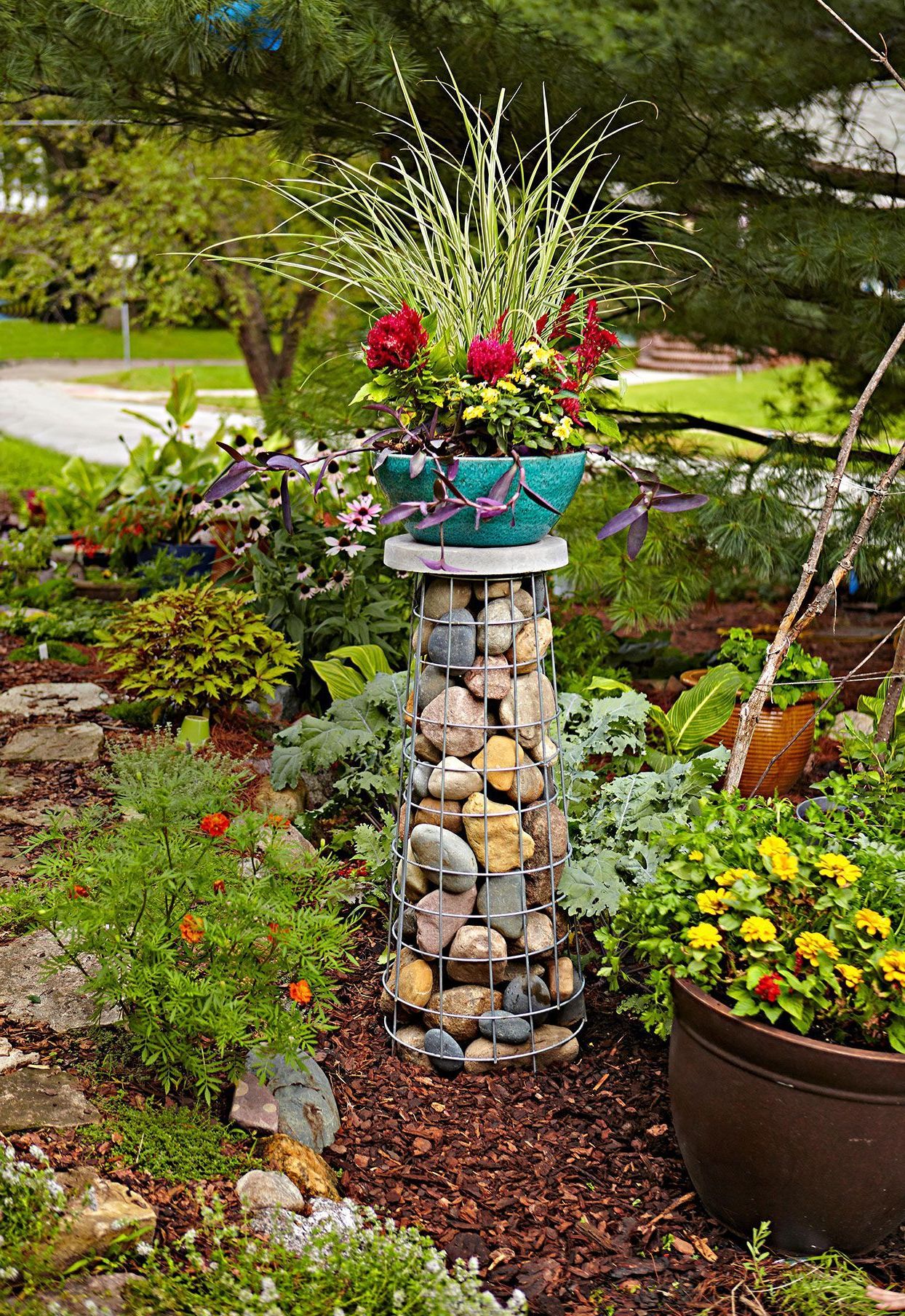 Best And Newest Stone Plant Stands In How To Build A Gabion Plant Stand That Will Add A Statement Vertical Accent  To Your Garden (View 5 of 15)