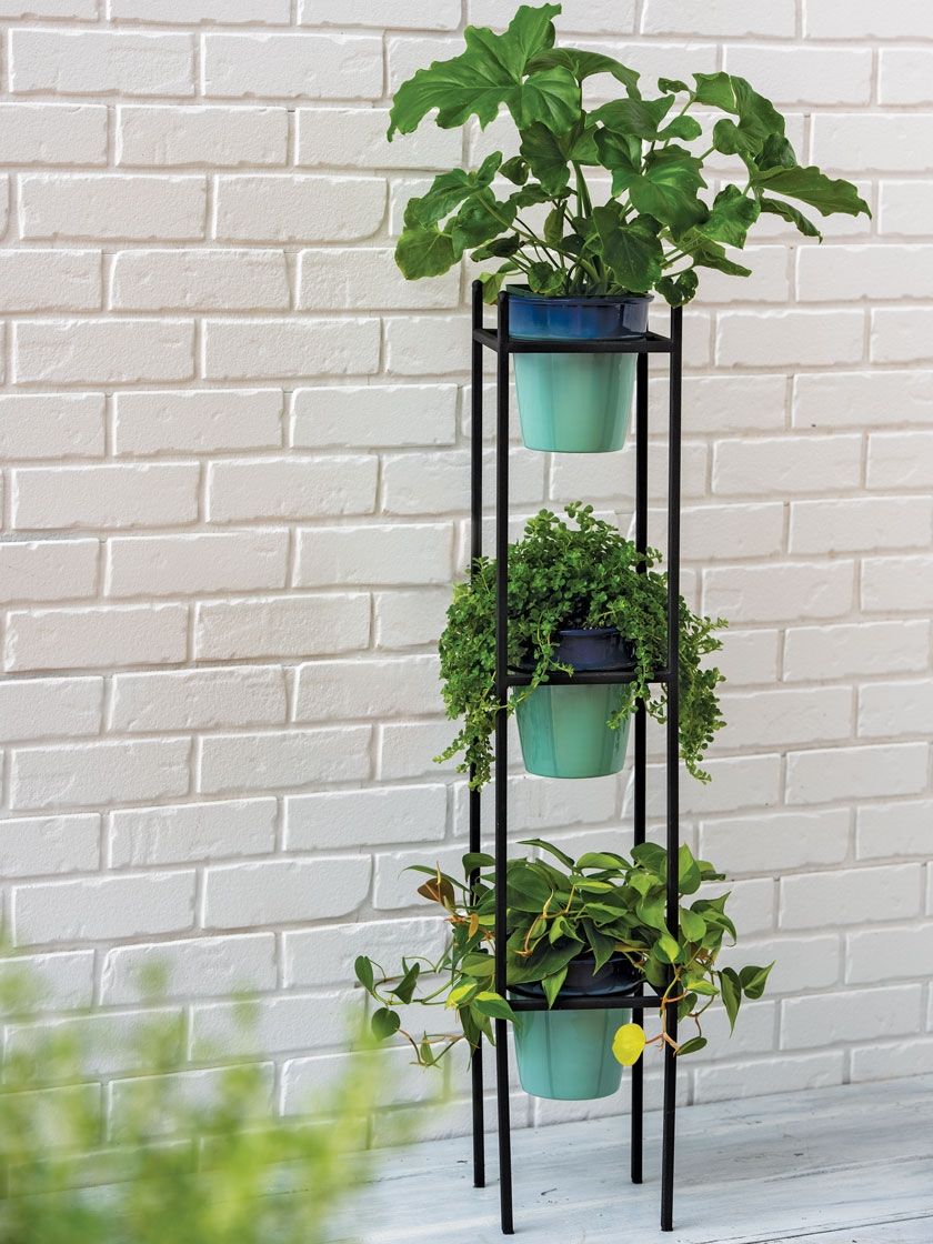 Most Popular Green Plant Stands Intended For Steel Vertical Plant Stand With 3 Blue Metal Pots (View 6 of 15)