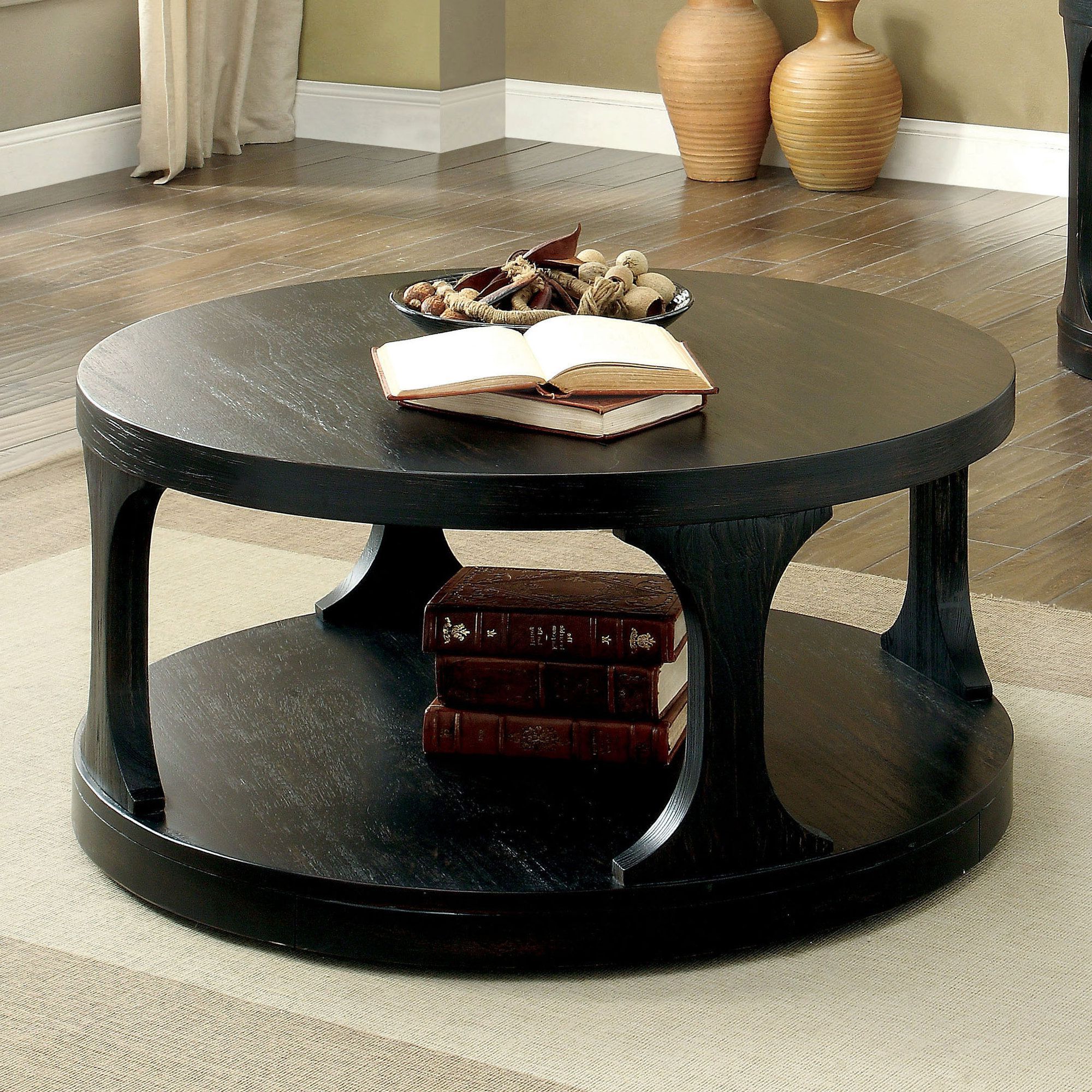 Bring A Touch Of Elegance To Your Home With A Black Circle Coffee Table Pertaining To Well Liked Full Black Round Coffee Tables (Photo 9 of 15)
