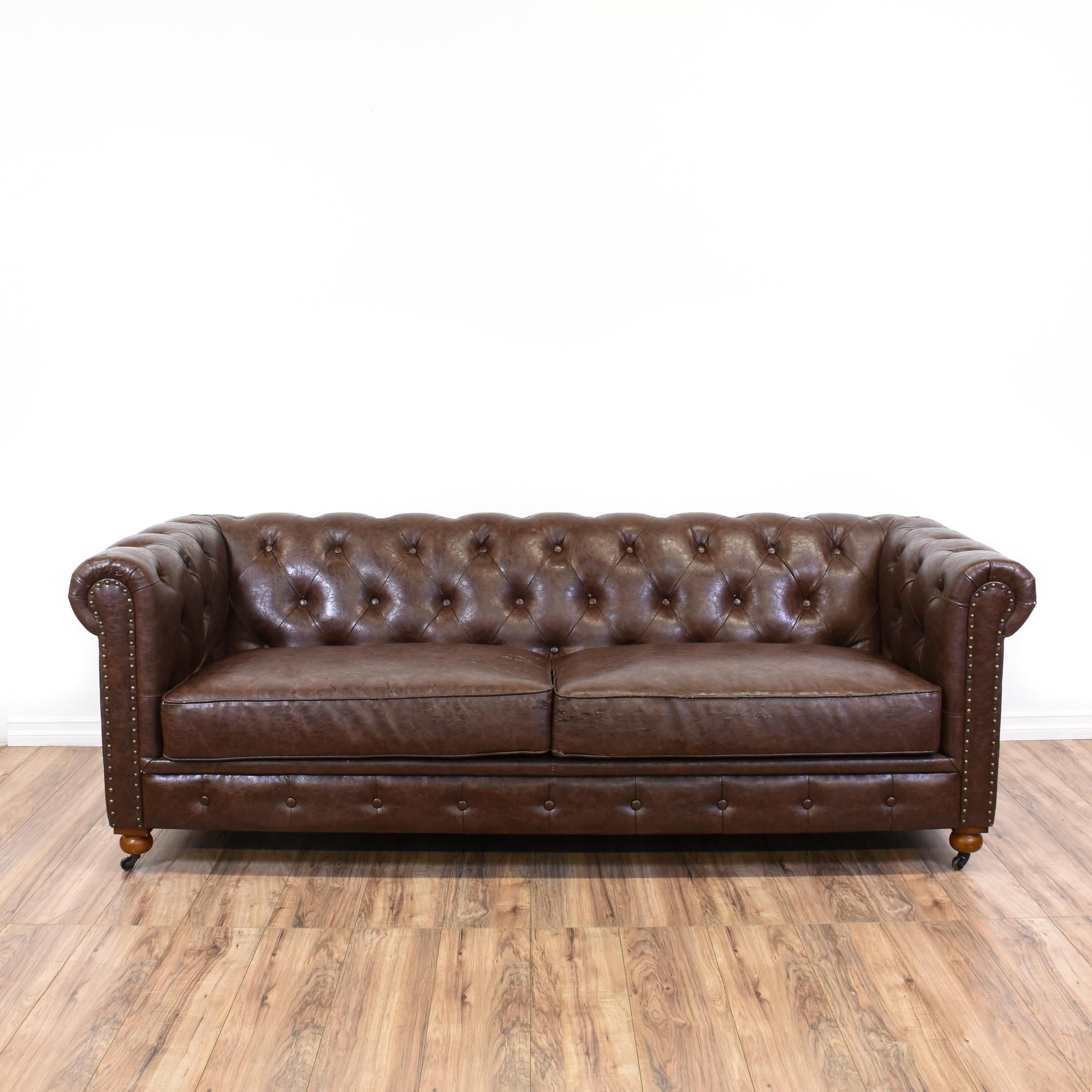 This Chesterfield Sofa Is Upholstered In A Faux Brown Leather With A With Recent Faux Leather Sofas In Dark Brown (Photo 10 of 15)