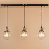 Bronze With Clear Glass Pendant Lights (Photo 8 of 15)