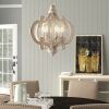 Weathered Driftwood And Gold Lantern Chandeliers (Photo 15 of 15)