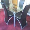 Extending Glass Dining Tables And 8 Chairs (Photo 23 of 25)