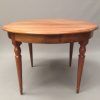 Reclaimed Teak And Cast Iron Round Dining Tables (Photo 3 of 15)