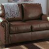 Faux Leather Sofas In Chocolate Brown (Photo 10 of 15)